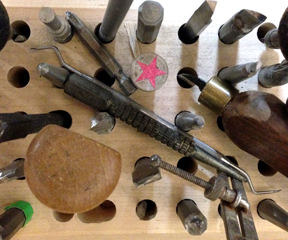 Close-up of Moore Wood Type's tools
